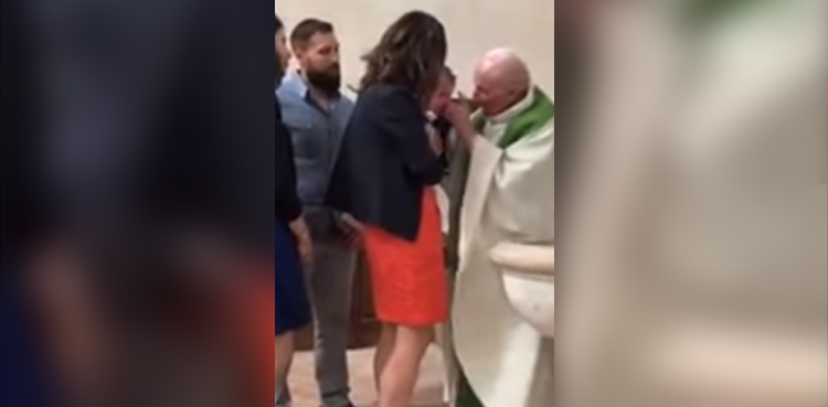 priest-slapped-a-baby